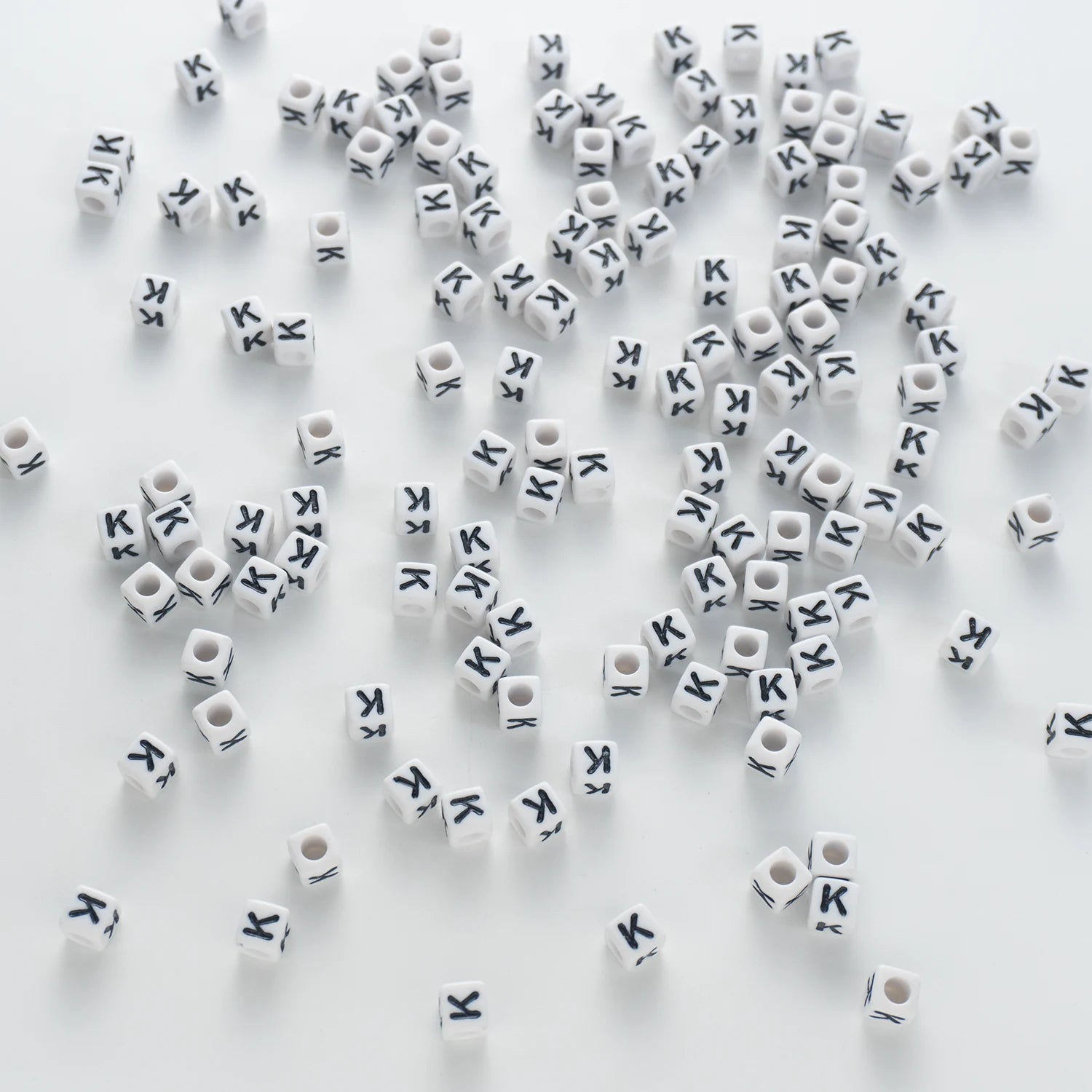 BW-00122-BD-03-black-letter-white-opaque-cube-alphabet-beads-single-k-7mm
