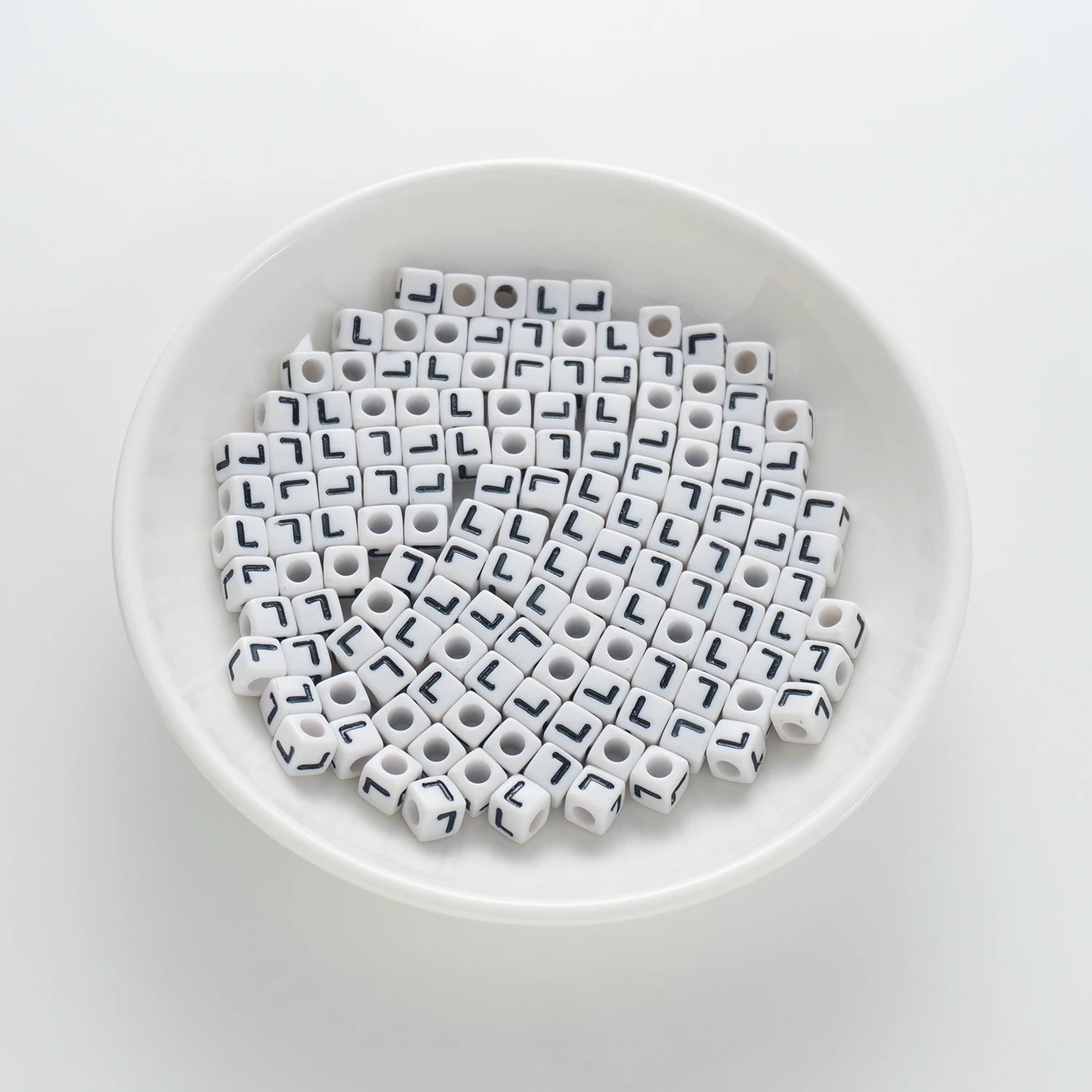 BW-00123-BD-01-black-letter-white-opaque-cube-alphabet-beads-single-l-7mm