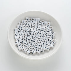 BW-00123-BD-01-black-letter-white-opaque-cube-alphabet-beads-single-l-7mm